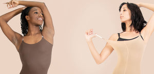 Two women posing in dance clothing
